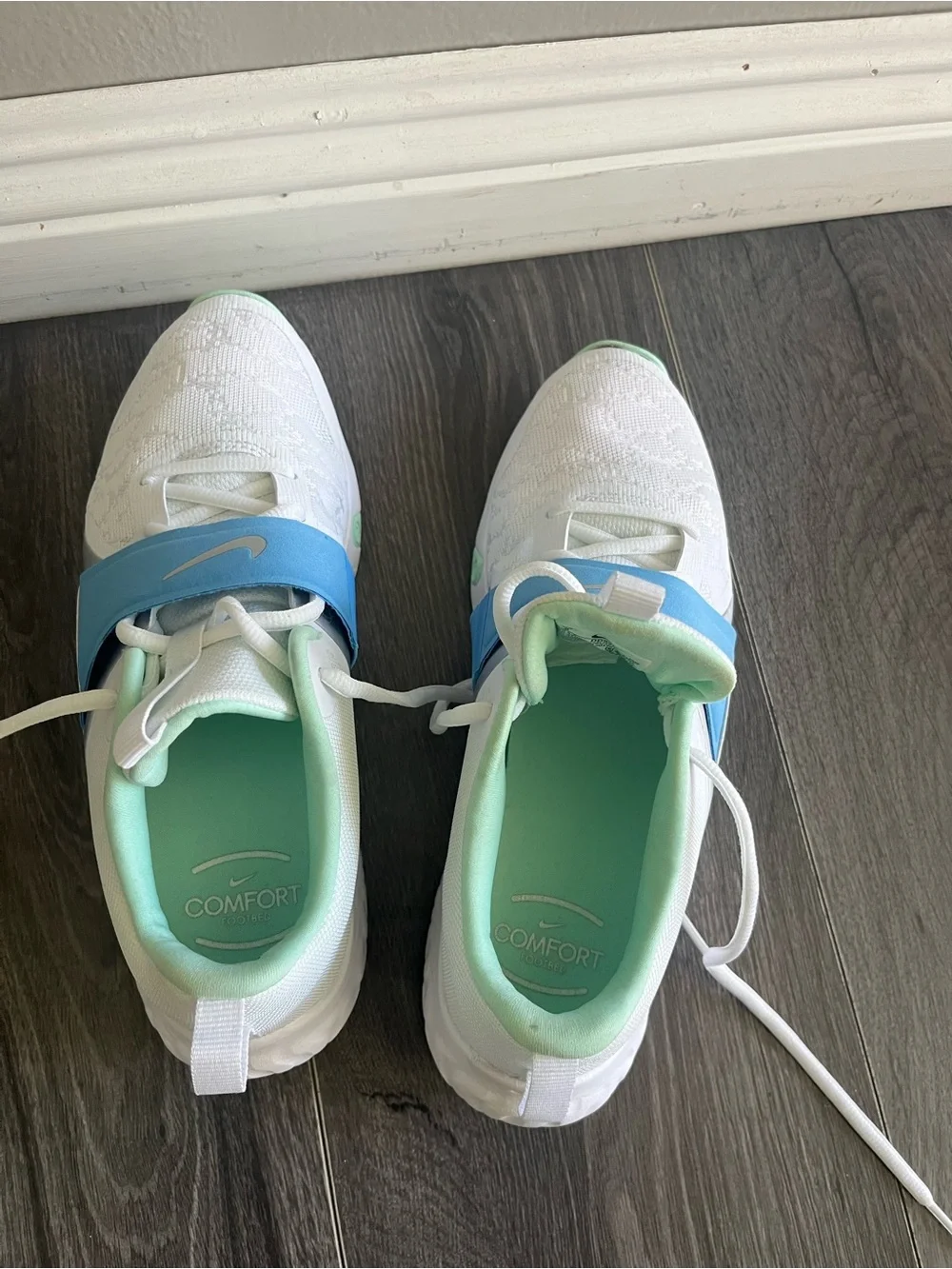 Women’s Nike White Sneakers with Light Blue Strap and Mint Lining